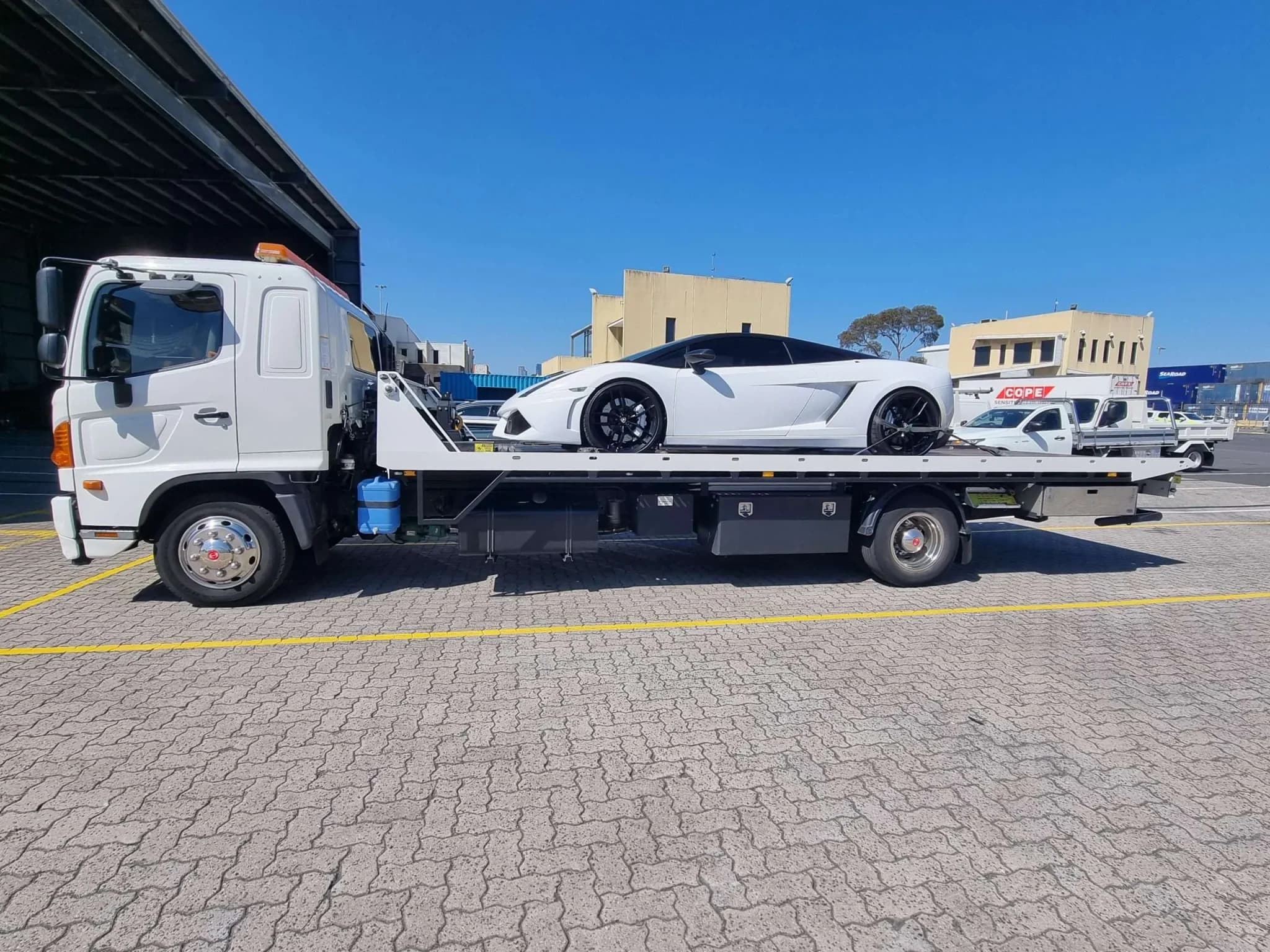 Tilt Pro Towing truck loading a vehicle